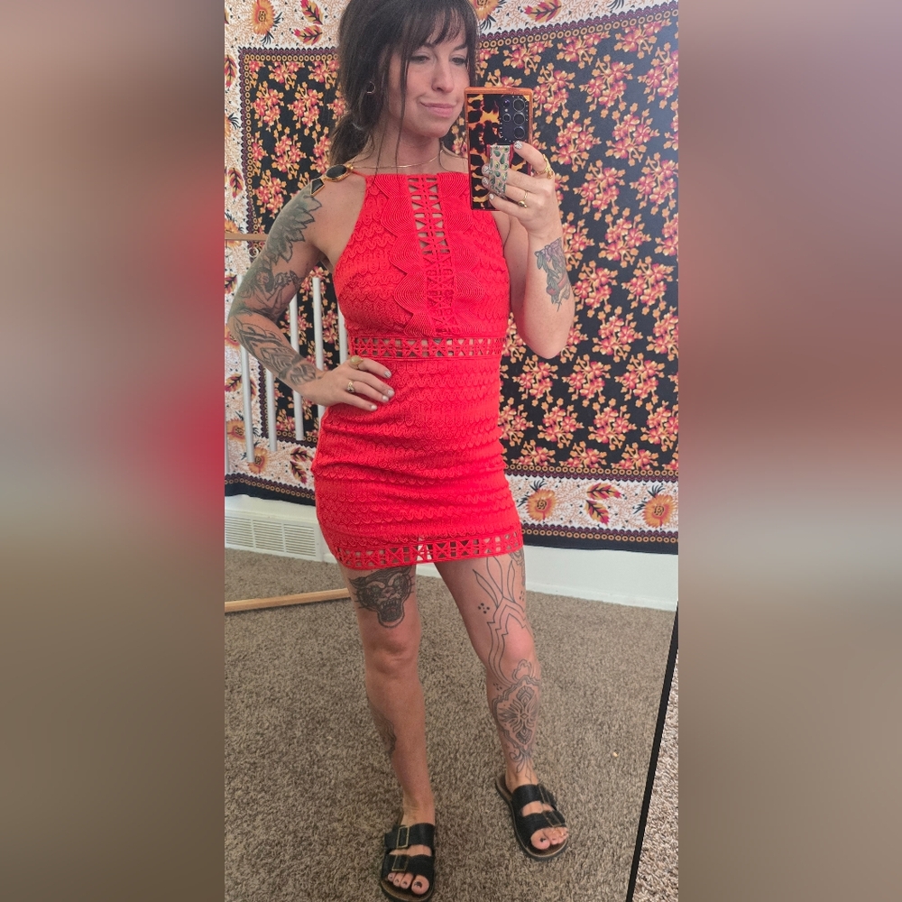 Body con little red mini dress open back embroidered.